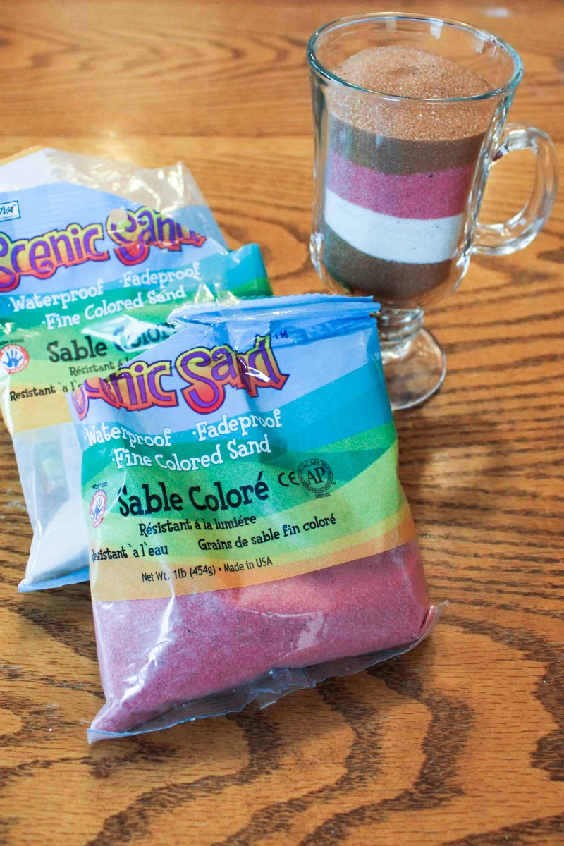 Layer Scenic Sand colored sand into a glass or plastic mug to create layers of "ice cream" for an ice cream sundae sculpture.  #coloredsand
